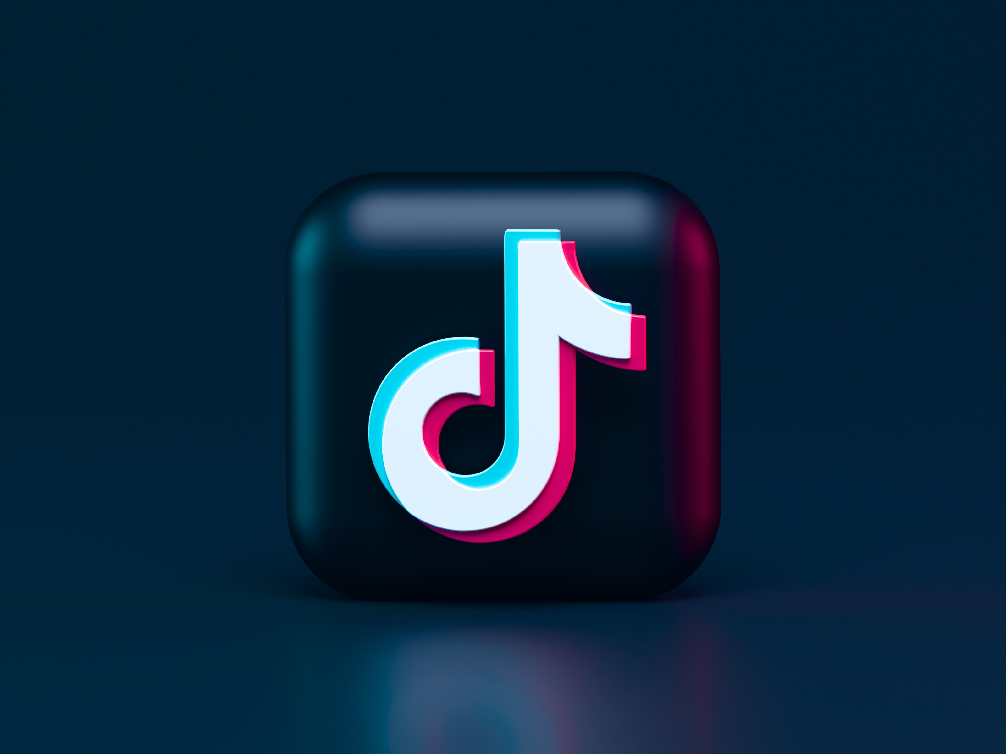TikTok logo icon on a dark background