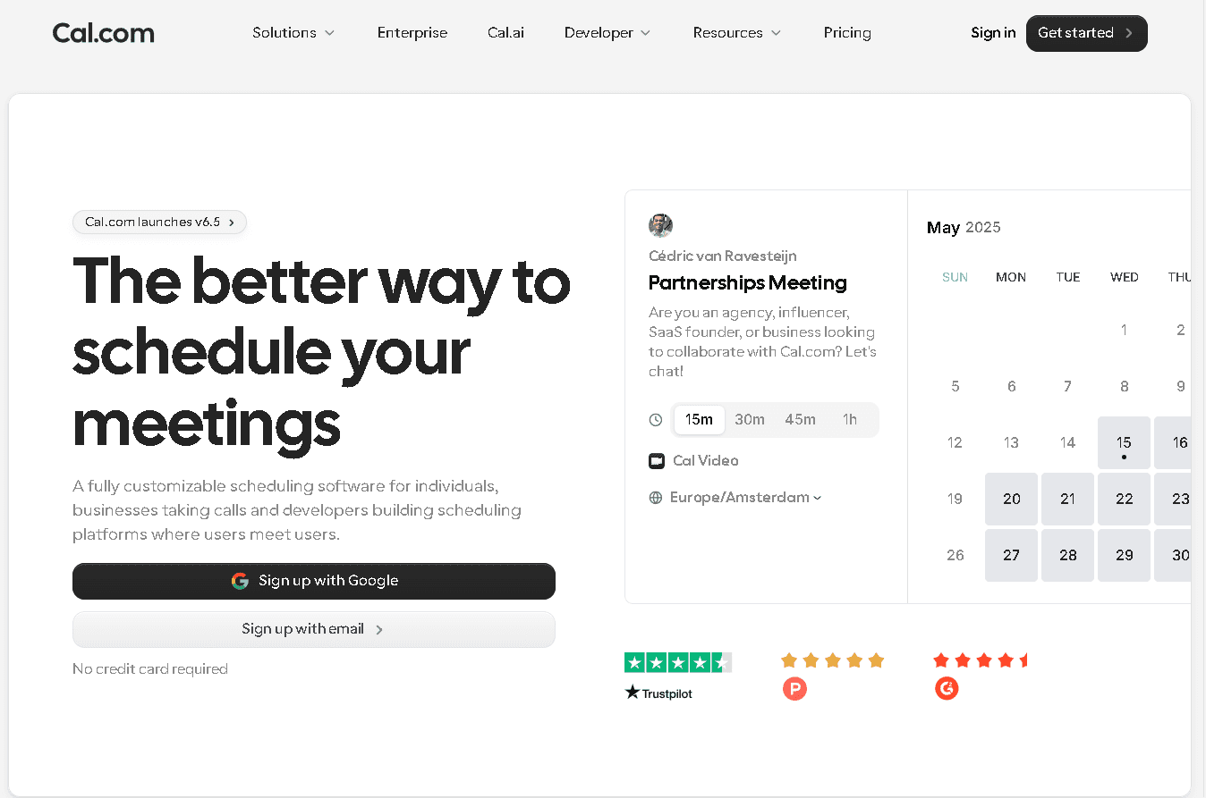 The Cal.com homepage interface showcasing an embedded booking calendar widget for a Partnerships Meeting.