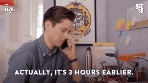 TV still of a man on the phone about time zones