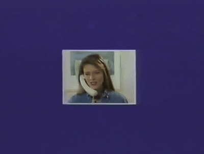 Vintage video still of a woman on the phone