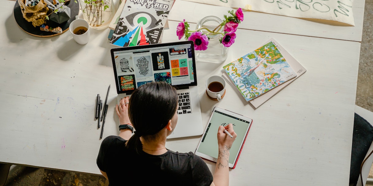Overhead view of a creative working at a laptop
