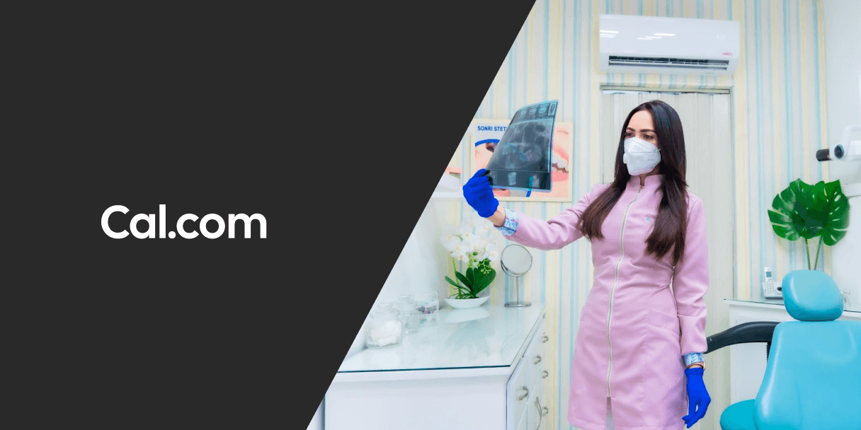 Dentist holding an X-ray in a dental office