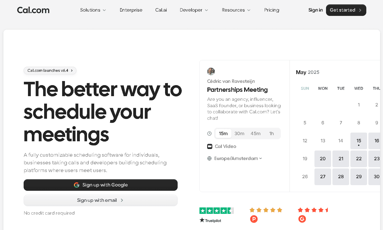 Cal.com homepage featuring the headline "The better way to schedule your meetings" alongside a clean, interactive booking calendar interface for a partnerships meeting.