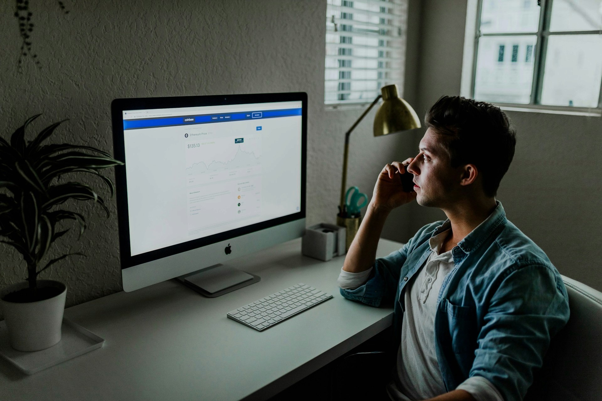 A developer or manager reviewing data workflows and scheduling metrics on a large desktop monitor.