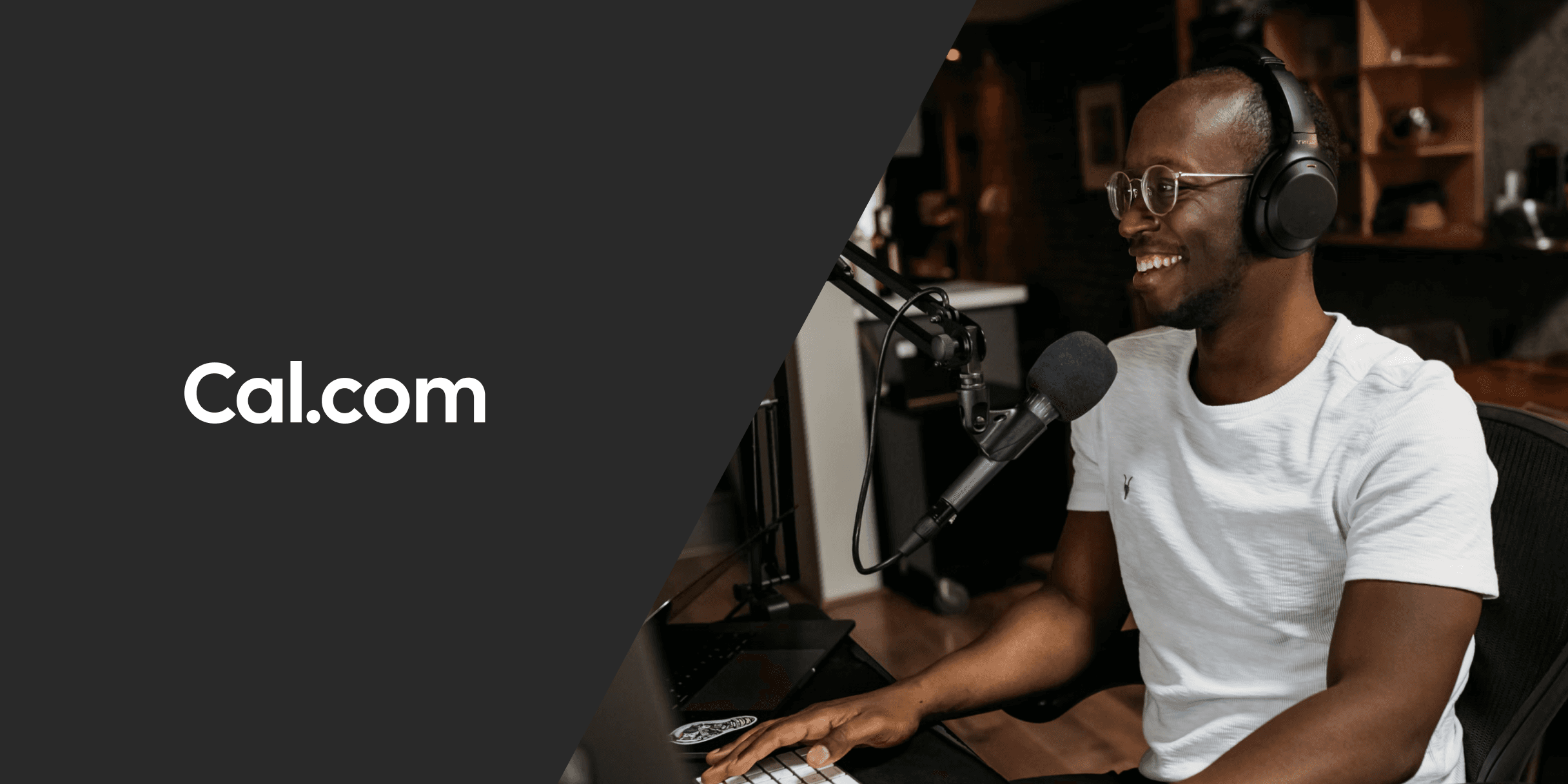 Podcaster recording at a desk with microphone and headphones