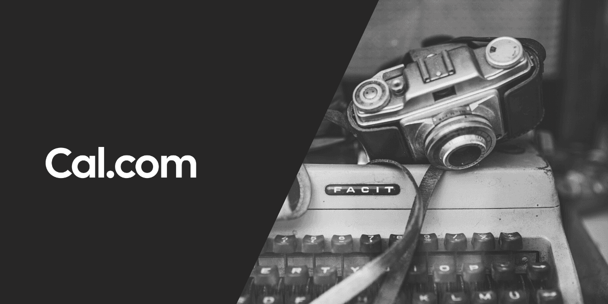 Vintage camera resting on a typewriter