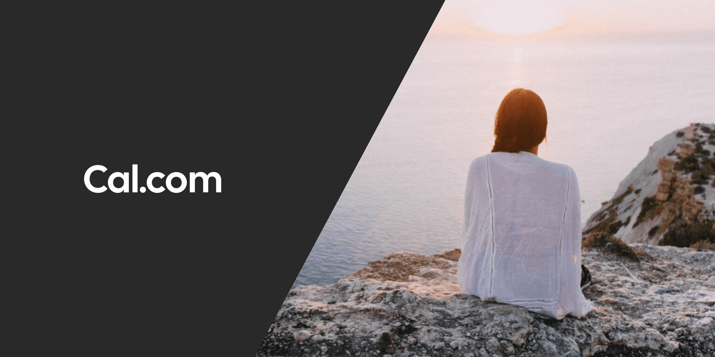 Cal.com logo beside a woman sitting on coastal rocks at sunset