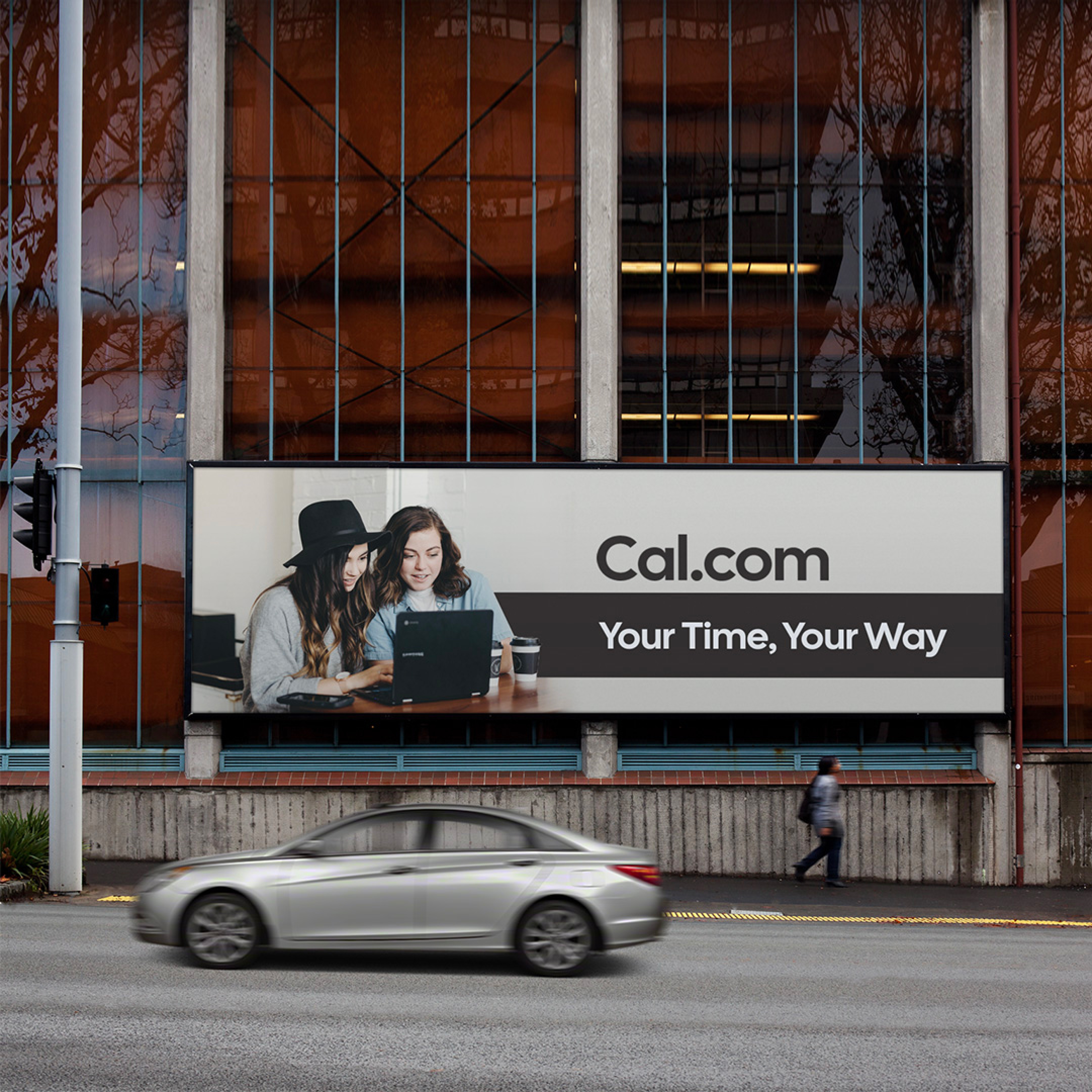 Billboard ad reading Cal.com Your Time Your Way