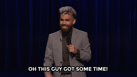 Comedian on stage saying oh this guy got some time