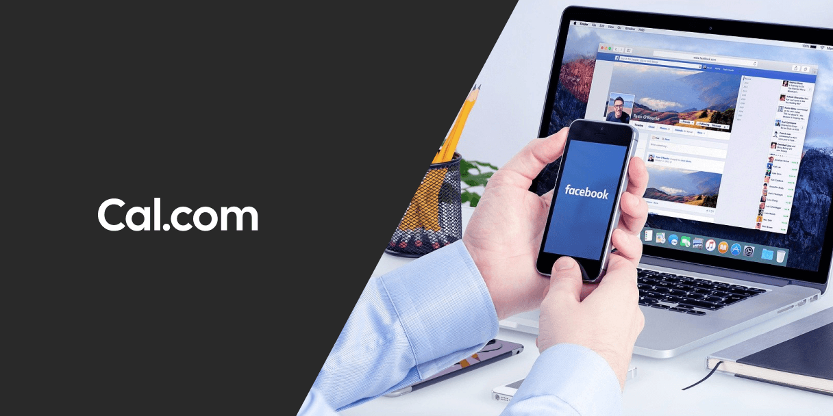 Hand holding phone with Facebook app open