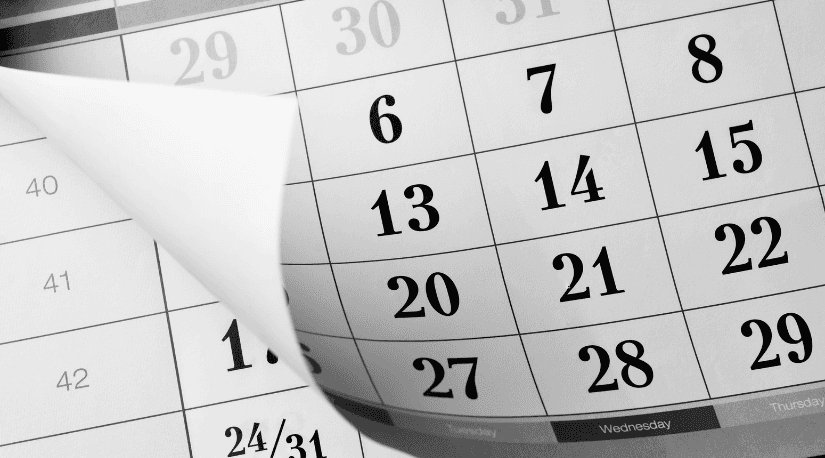 Close-up of a black and white wall calendar